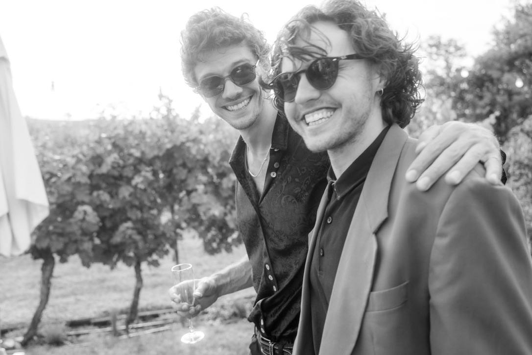 Mabou – two friends laughing in a vineyard, black and white